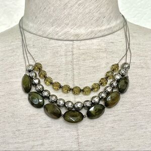 Green and silver tone beaded multi strand statement necklace